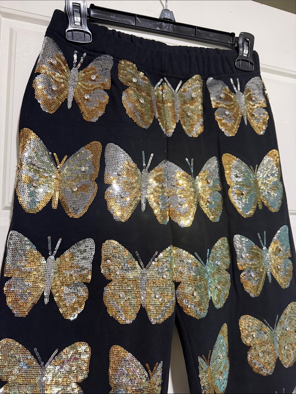 QUEEN OF SPARKLES Black Joggers with Gold Sequin Butterflies - Picture 2 of 4